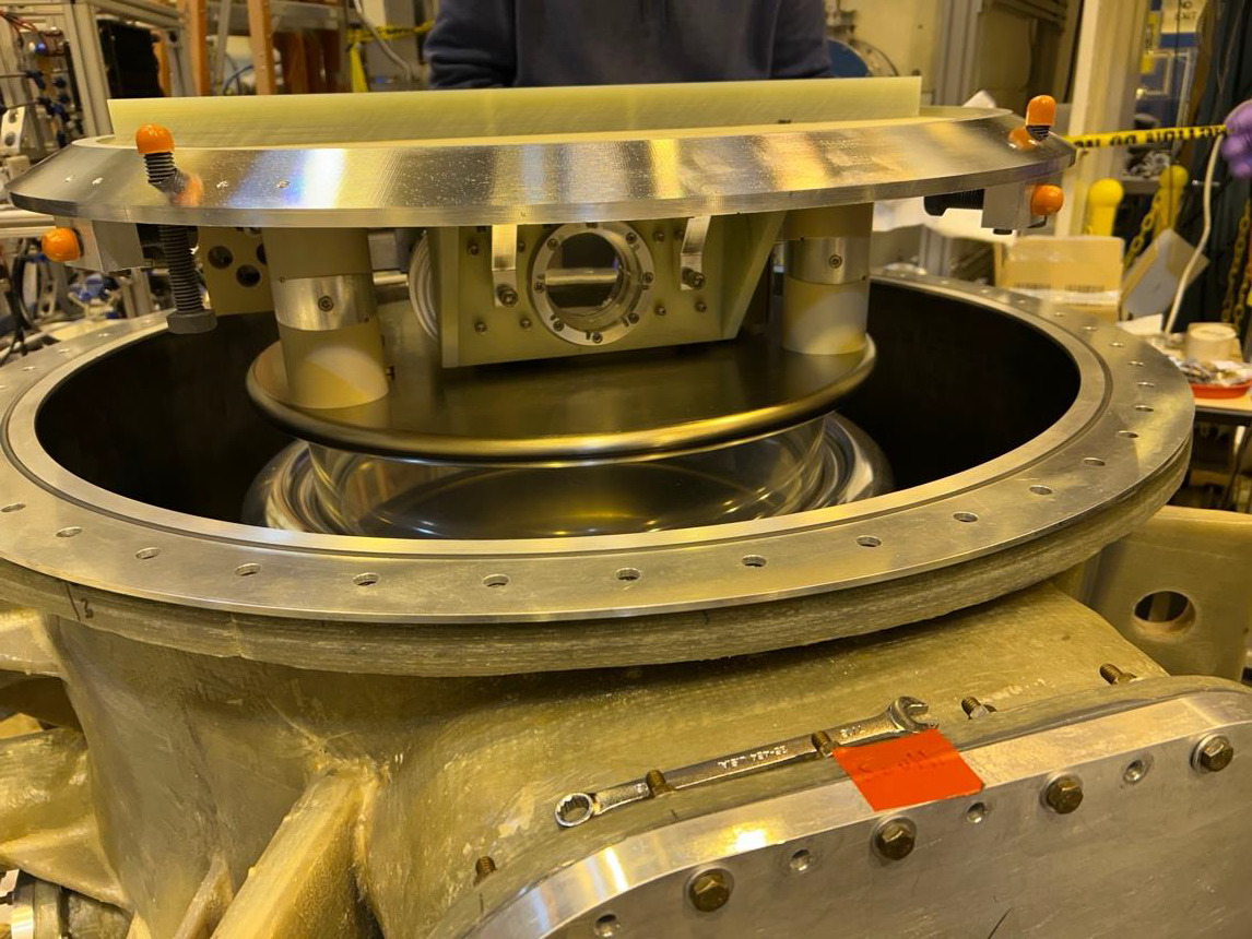 nEDM valve assembly being fitted into the open vacuum vessel